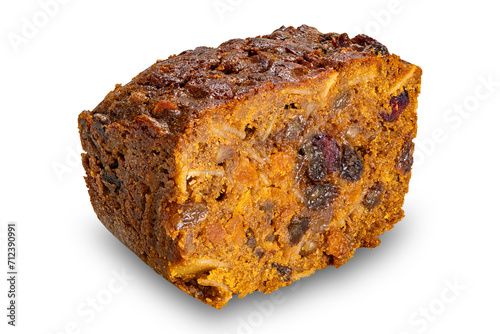 Closeup view of cut loaf homemade dark fruitcake isolated on white background with clipping path.