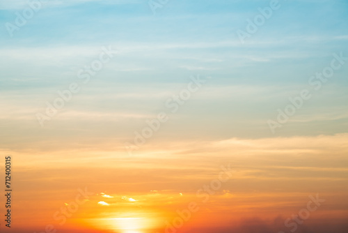 Beautiful   luxury soft gradient orange gold clouds and sunlight on the blue sky perfect for the background  take in everning Twilight  Large size  high definition landscape photo
