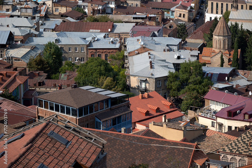 View of the old city in Tbilisi. Roofs of Teflis. sunny summer day. View of the old city in Tbilisi. Roofs of Teflis. sunny summer day.