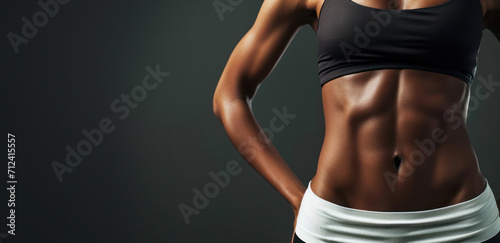 Generative AI, Sporty woman with great abdominal muscles shows stomach in sportswear on neutral background
