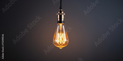 Contemporary pendant with old-fashioned bulb. photo