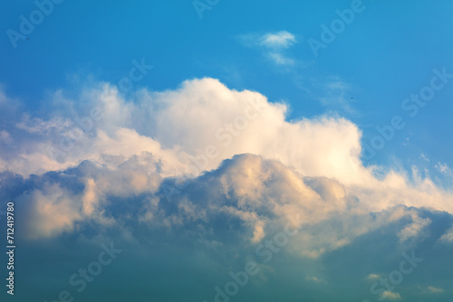 Blue cloudy sky on a sunny day. Sky texture. Abstract nature background