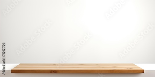 White background isolates empty wooden table/counter for product display. © Sona