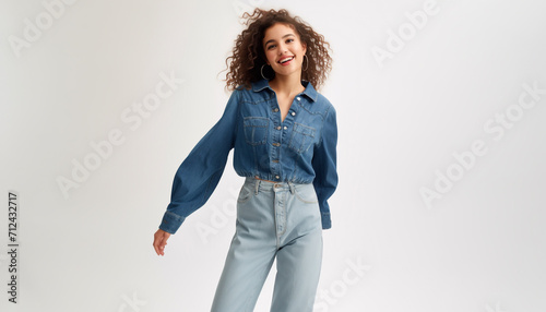 a young happy girl wearing a jean blouse kiabi style