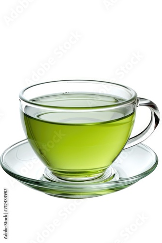 A simple and refreshing cup of green tea resting on a saucer. Suitable for various uses