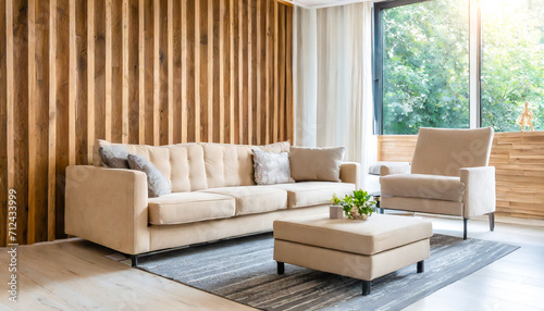 Beige corner sofa against of wooden paneling wall. Minimalist interior design of modern living room.
