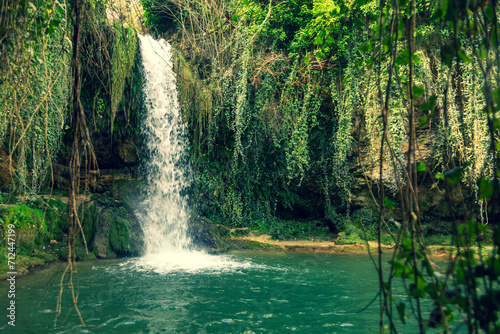 Tobera waterfall in Burgos. Surrounded by green vegetation. Located in Castilla y Leon  Spain