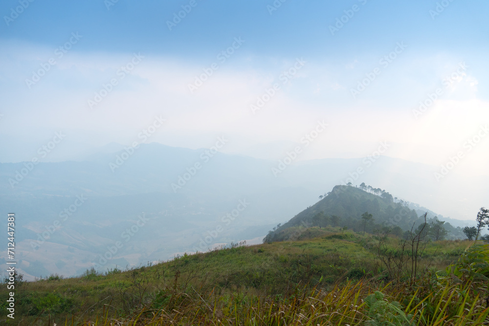Fototapeta premium Landscape view to mountain peak. Route heads to the mountaintop view point of Phu Nom. At Phu Langka Phayao Province of Thailand. 