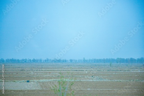 Pingliang City, Gansu Province - Road and field scenery under the blue sky photo