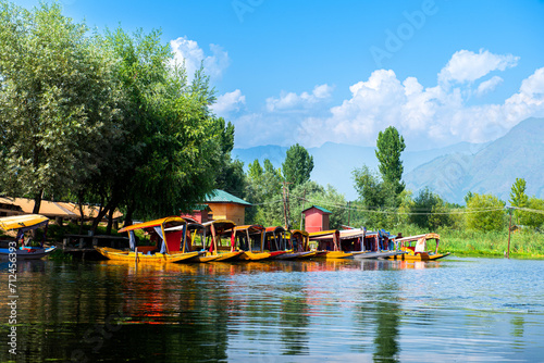 Dal Lake and the beautiful mountain range in the background, in the summer Boat Trip, of city Srinagar Kashmir India.