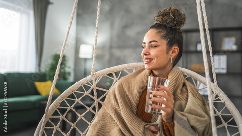 Canvas Print one woman beautiful young female sit at home with glass of water