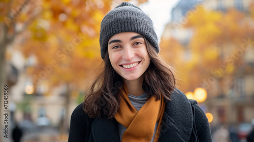 French Woman Smiling in Autumn Cityscape