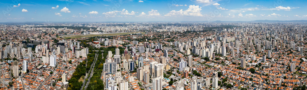 Big City landscape with airport São Paulo Brazil global south - obrazy, fototapety, plakaty 