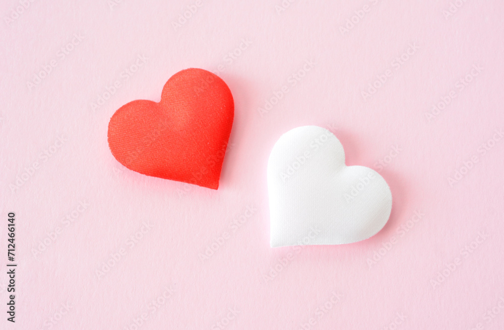 red and white hearts isolated on pink background top view