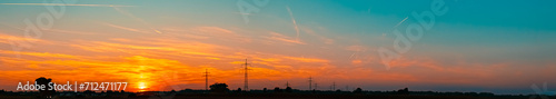 High resolution stitched alpine summer sunset panorama with overland high voltage lines near Aholming, Deggendorf, Bavaria, Germany © Martin Erdniss