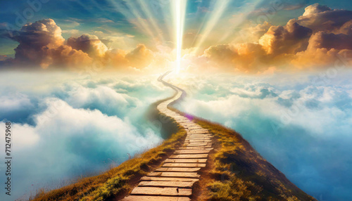 Concept of a path winding through the clouds, ending at a brilliant light in the distance. It symbolizes heaven, afterlife, a near-death experience, or simply the path to a goal and bright future photo