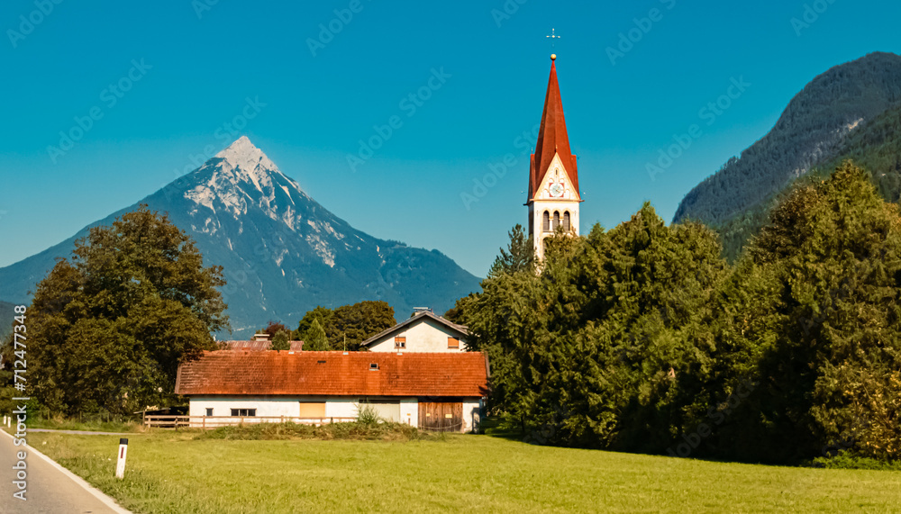 Alpine summer view with a church near Schoenwies, Landeck, Tyrol, Austria