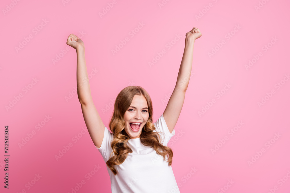 Portrait of lady win celebrate her new beauty product win in competition for best quality raised fists up isolated on pink color background