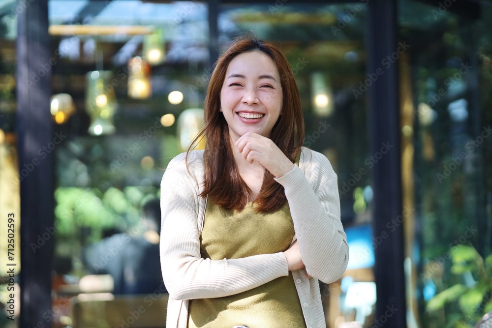 Fototapeta premium portrait of a smiling woman in cafe
