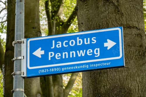 Blue street name sign of Jacobus Pennweg in Hilversum, Netherlands photo