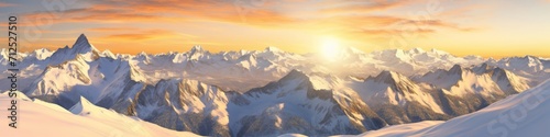 A snow-covered mountain panorama at golden hour, with peaks glowing in the warm light
