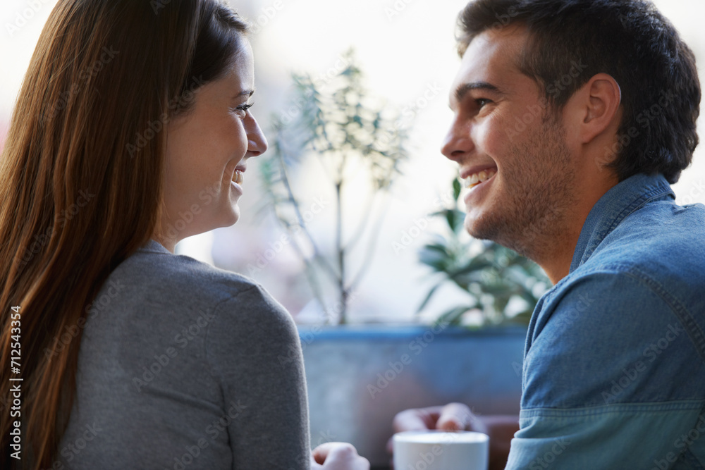 Cafe, relax and face of couple smile for romantic date, morning coffee break or enjoy conversation in restaurant. Relationship partner, eye contact or profile of woman talking with boyfriend in diner Cafe, relax and face of couple smile for romantic date, morning coffee break or enjoy conversation in restaurant. Relationship partner, eye contact or profile of woman talking with boyfriend in diner