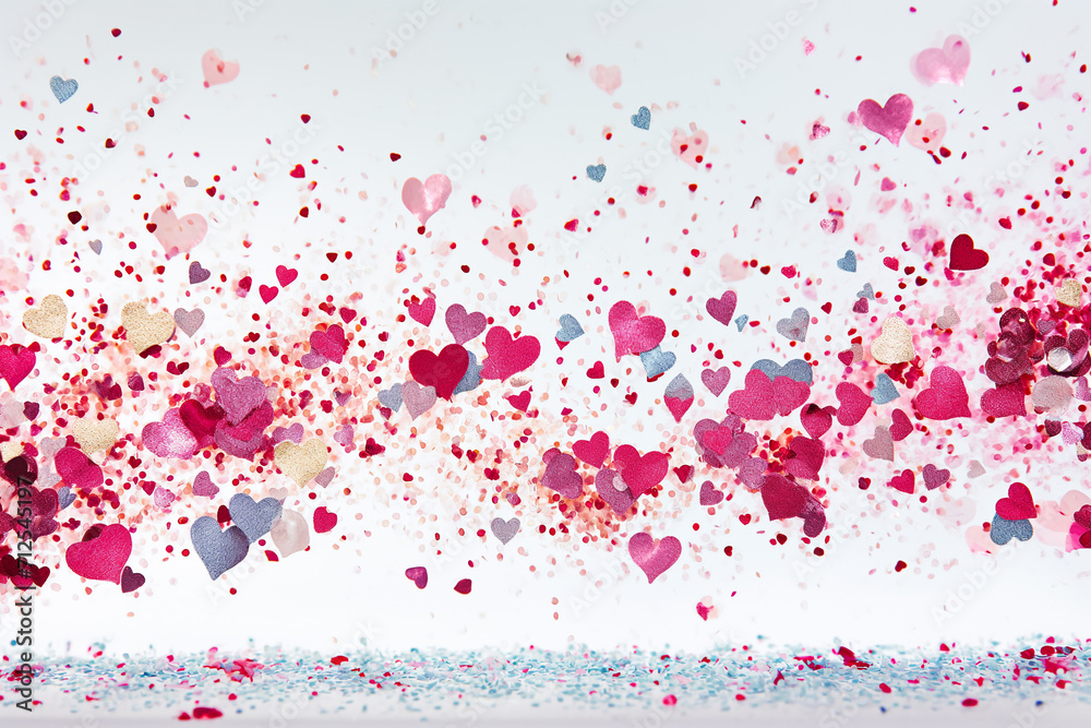 confetti hearts in various sizes,  a dynamic and playful Valentine's banner. The harmonious blend of colors mirrors the diversity of love in all its form