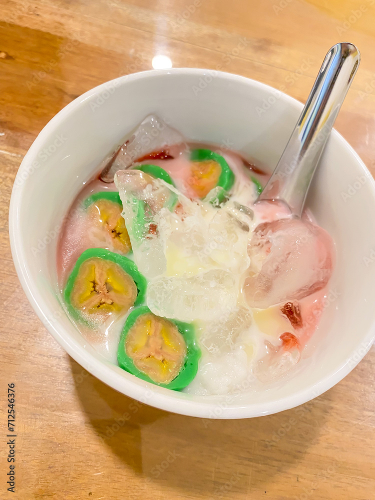 Es Pisang Ijo is traditional dessert from Makassar, South Sulawesi. Indonesian authentic typical sweet food. Es Pisang Ijo is traditional dessert from Makassar, South Sulawesi. Indonesian authentic typical sweet food.