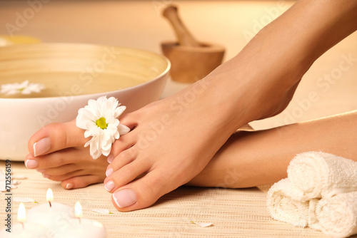 Beautiful female feet after spa treatment.