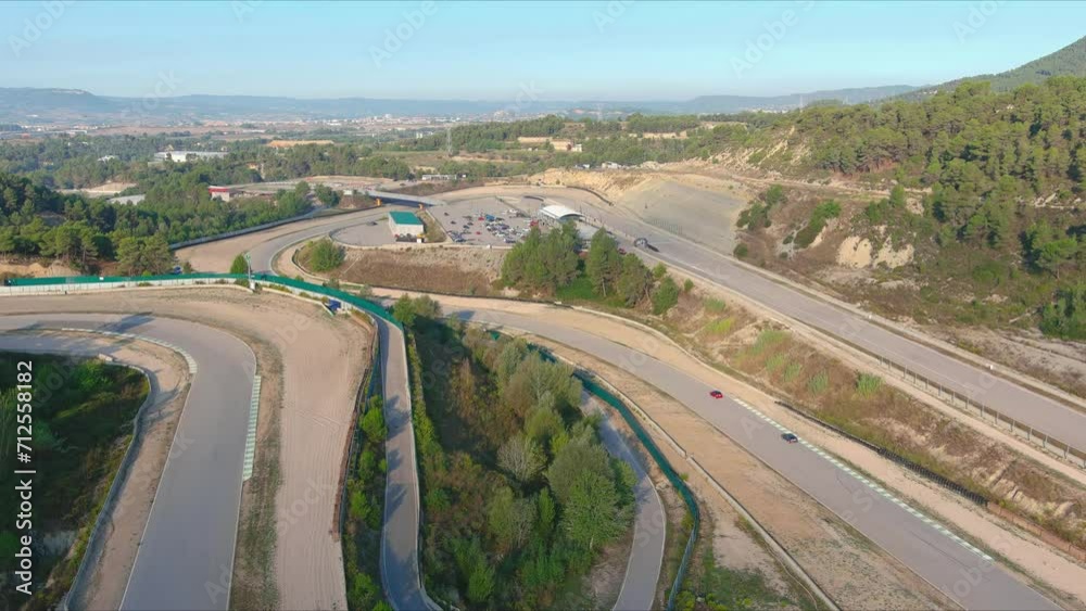 Aerial view of Circuit Parcmotor Castelloli complex and cars running Aerial view of Circuit Parcmotor Castelloli complex and cars running