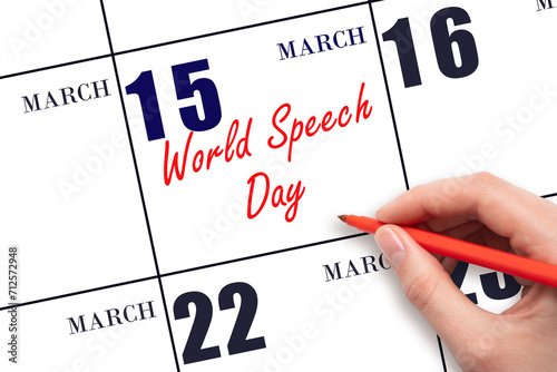 March 15. Hand writing text World Speech Day on calendar date. Save the date.