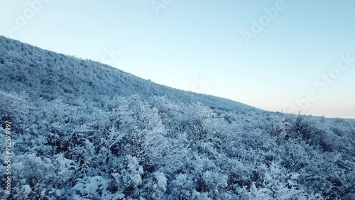 Winter mountain snow field, car drive on snow country road