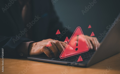 Danger system warning hacked alert on computer screen, cyber attack. Cybersecurity vulnerability identity technology internet, virus, data breach, malicious. Fraud cybercrime security attention.