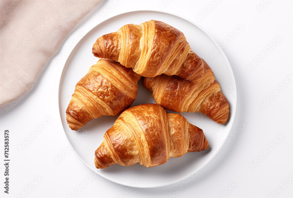 croissants and pastry on white plate top view for use on product with white backgorund
