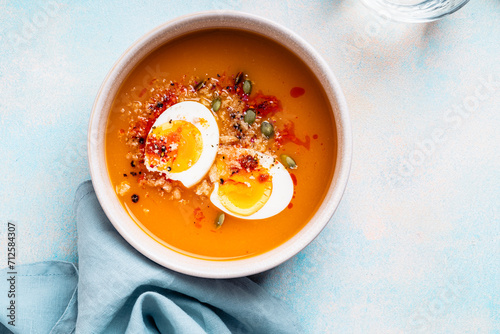 Butternut squash soup with boiled egg, autumn or winter delicious healthy food