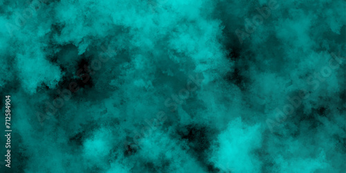 Abstract grainy and empty smooth grunge texture watercolor paper background. Defocused Lights and Dust Particles with soft blue clouds on dark background. Teal design element cumulus cloud.
