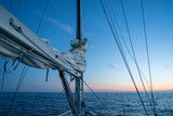 Sailing in twilight or sunset on the gulf of Biscay.