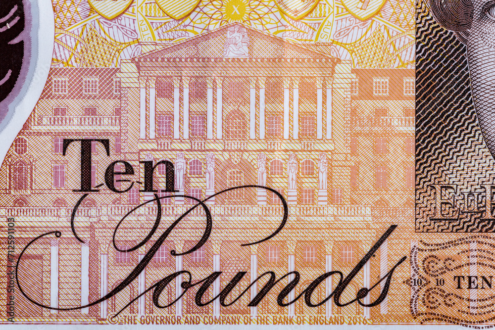 Obraz premium Vintage elements of paper banknotes.Closeup of 10 Pound sterling banknote for design purpose.Business and stock concept for England