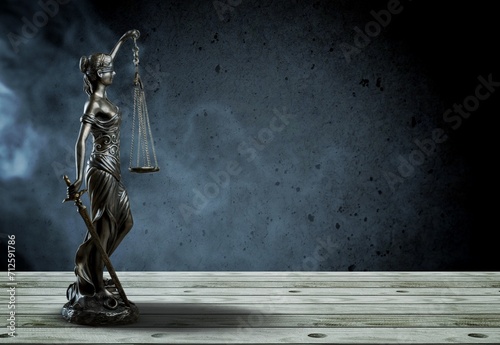 No law concept. Bronze Statue of Justice in smoke