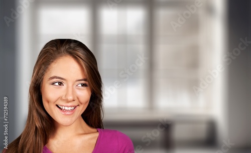 face of beautiful young woman breathing fresh air