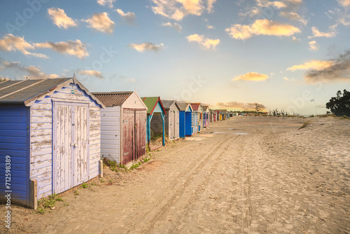 beach houses on a sandy beach in England