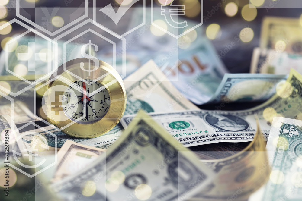 Fototapeta premium Magnetic compass. The concept of finding successful solutions to problems. Compass, map, sleeves, hands.