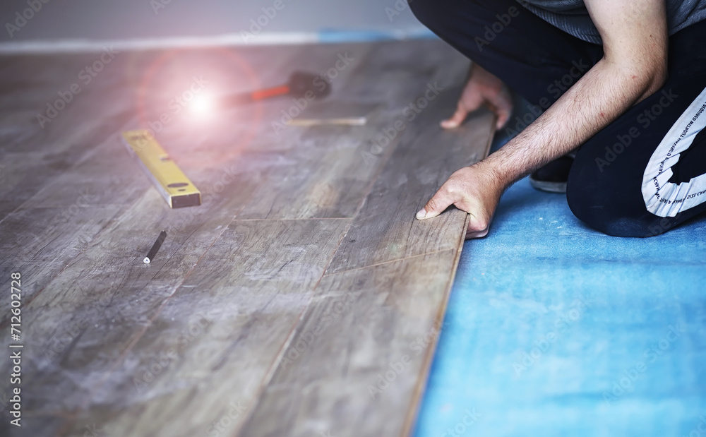 Longitudinal lock joint - The sequence of technological methods for laying and installation of floating flooring - laminate - professional work - selective focus Longitudinal lock joint - The sequence of technological methods for laying and installation of floating flooring - laminate - professional work - selective focus