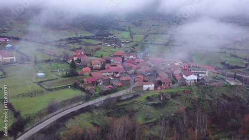 Small village in the mountains of León amidst the fog. Selga de Ordas photo