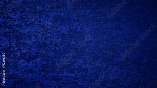 luxury antique opulent fabric wall in blue color tone. polished metallic wall texture use as background with blank space for design. shiny dark blue grunge wallpaper.