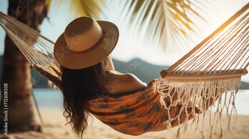 A young woman relaxing in hammock on beach with sunset view, Generative AI. photo