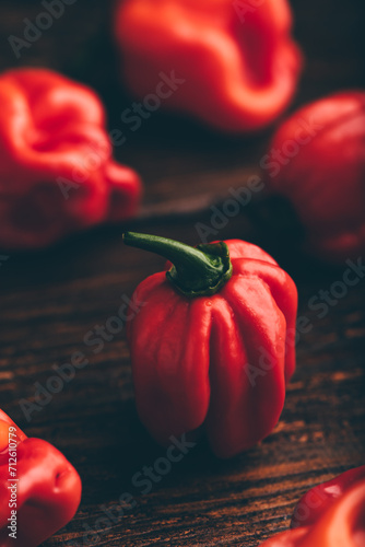 Red Habanero Chili Peppers on Wooden Surface