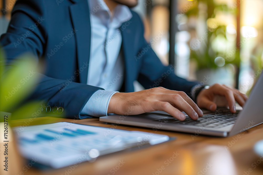 Businessman Using Laptop Computer in Suit for Work Businessman Using Laptop Computer in Suit for Work