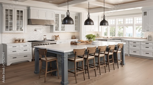 coastal interior design concept dining natural material cosy comfort Woven pendant lights bring a modern coastal feeling to this light and airy kitchen The stylish counter stools are a favorite theme