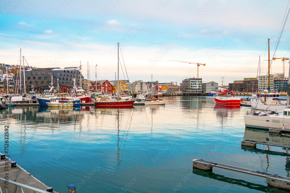View of a marina and harbor in Tromso, North Norway. Tromso is considered the northernmost city in the world with a population above 50,000